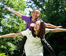 Child and mother imitating airplanes